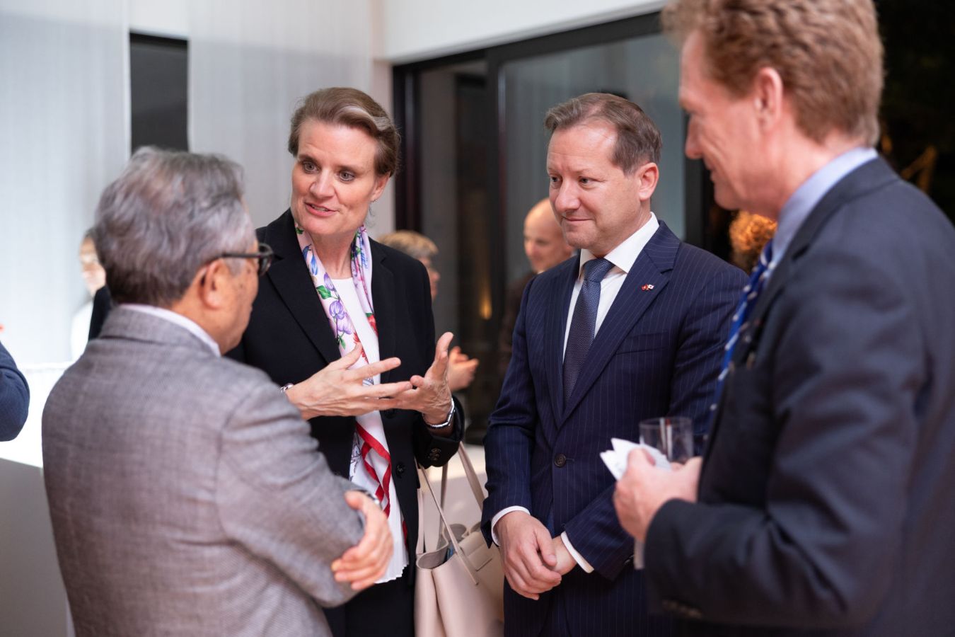 Left to right: Dr. Sachio Semmoto, State Secretary Martina Hirayama, Ambassador Roger Dubach, Prof. Christian Schwarzenegger at the Swiss Embassy in Tokyo.